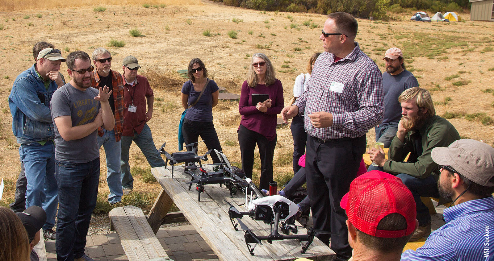Author Sean Hogan discusses drone technology with a group of managers from the University of California Natural Reserve System during a field day in October at the UC Berkeley Blue Oak Ranch Reserve, Santa Clara County.