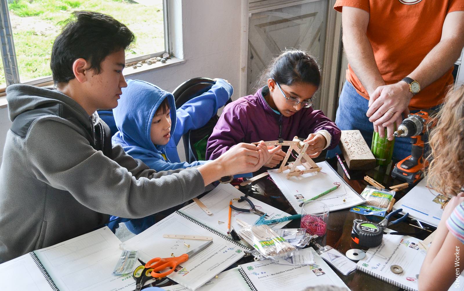 To help improve scientific literacy among youth, the 4-H Youth Development Program offers a design-based science curriculum, Junk Drawer Robotics, that features engineering activities.