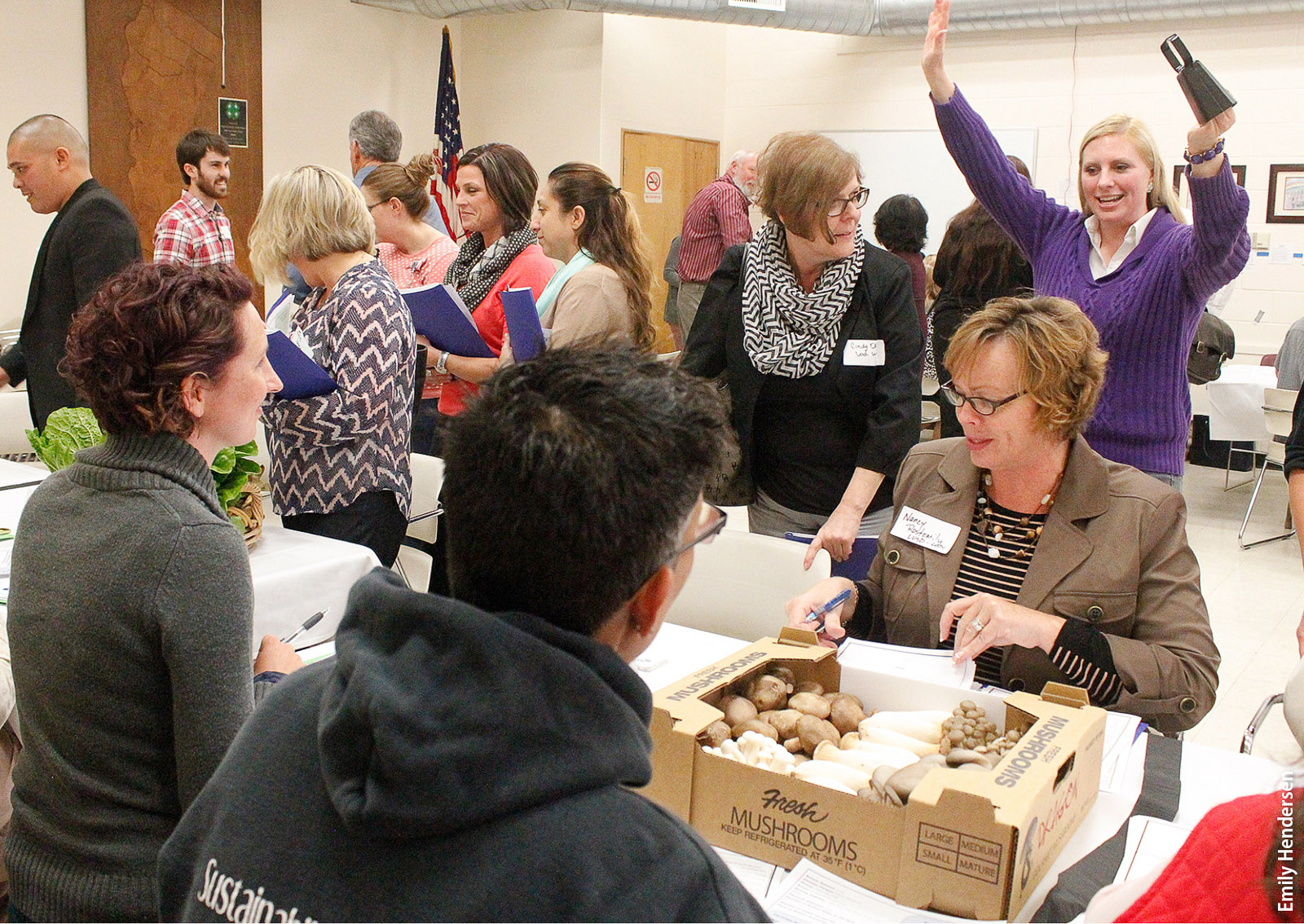 The Yolo County Department of Agriculture has hosted a series of Marketplace Exchanges, economic matchmaking events similar in structure to speed dating. At the meeting above, in Woodland in November 2014, growers were paired with buyers, such as school food service purchasers, for a series of 5-minute conversations.