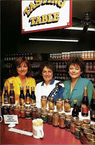 Carmen Kozlowski (center) with daughters Cindy (left) and Carol. Starting in 1951 with a 20-acre orchard of Gravenstein apples, the family diversified their business. Today they market Kozlowski Farms jams and jellies to visitors and mail-order customers nationwide.