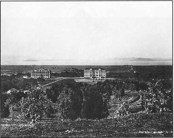 View of the grounds at the University of California, Berkeley, about 1880. South Hall, left, was the first building completed and housed the College of Agriculture in its basement. In the distance is San Francisco Bay. Photo from the Bancroft Library Archives, UC Berkeley.