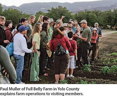 Paul Muller of Full Belly Farm in Yolo County explains farm operations to visiting members.