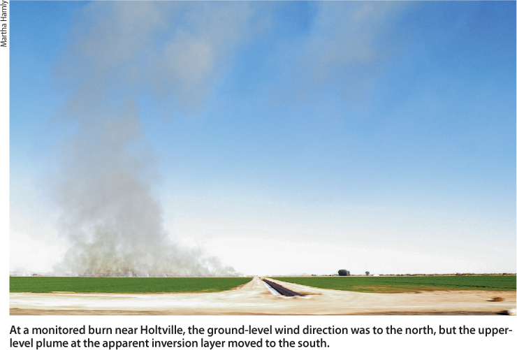 At a monitored burn near Holtville, the ground-level wind direction was to the north, but the upper-level plume at the apparent inversion layer moved to the south.